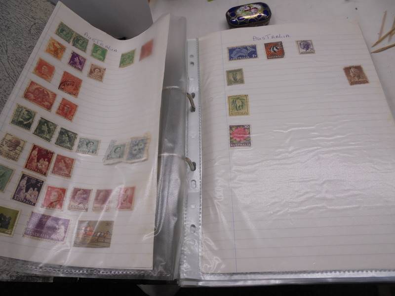 A large folder of UK stamps up to 2000 and a large folder of world stamps. - Image 2 of 17