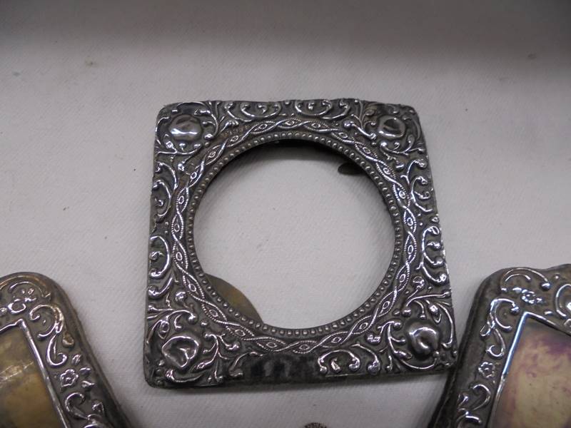 Three small silver photo frames and a silver pendant. - Image 2 of 5