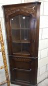 A dark oak glazed top corner cupboard, COLLECT ONLY