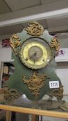 An old heavy metal mantle clock in working order, COLLECT ONLY.