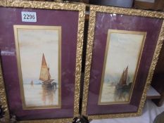 A pair of gilt framed and glazed watercolour seascapes.