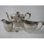 A three piece silver plate tea set, J T & Co.,
