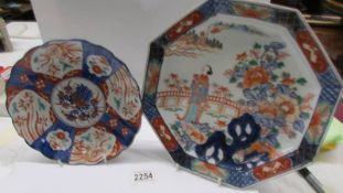 A Chinese octagonal plate 28cm diameter and another Chinese plate, 22 cm diameter