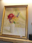 A framed oil on board floral study COLLECT ONLY