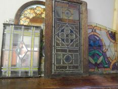 A quantity of stained and leaded glass windows and other glass. COLLECT ONLY.