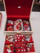 A jewellery box with a mixed lot of costume jewellery.