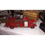 A large scale pressed steel fibre glass model of an American fire truck length 49cm