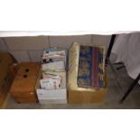 A quantity of vintage sewing patterns, a concertina sewing box & curtain material etc.