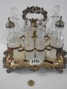 A Victorian silver plate and glass eight piece condiment set,