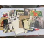A quantity of rock records including Jeff Beck, The Rolling Stones, John Lennon, Deep Purple, Pink