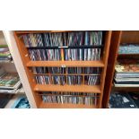 3 shelves of CDs including cabinet and shelves