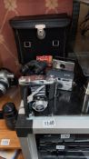 A Balda vintage camera with case and other