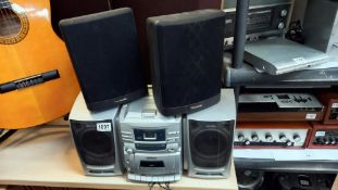 A Hitachi CX310 Boom Box a pair of Panasonic speakers