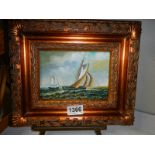 A gilt framed seascape featuring yachts, 30 x 25 cm.