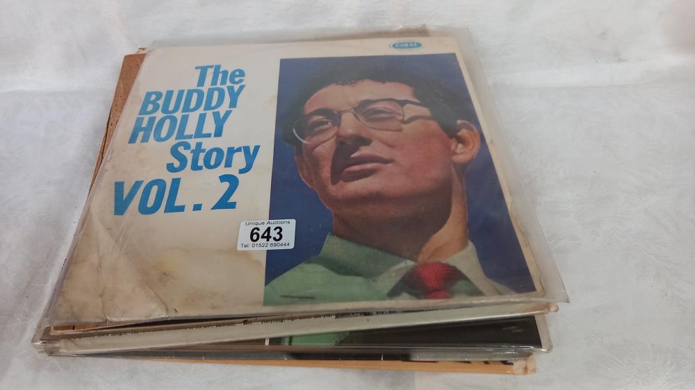 11 Buddy Holly albums including some early croal pressings.