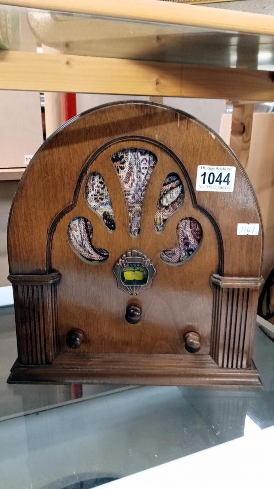 A wooden battery clock