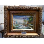 A gilt framed oil on board rural scene with windmills and fishing boats, 30 x 25 cm.