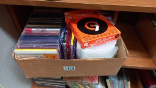 A box full of DVD / CD cases