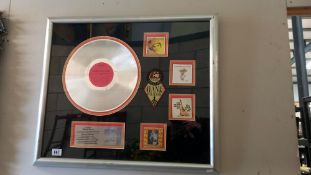 Platinum disc in frame, presented to Sandy Neese for 1000,000 sales of very best of Hank Williams