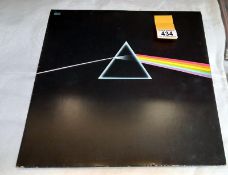 Pink Floy, dark side of the moon, white copy with poster