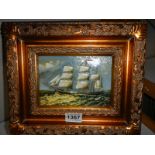 A gilt framed painting of a tall ship, 30 x 25 cm.