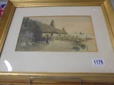 A framed and glazed watercolour coastal scene signed F McGinn, COLLECT ONLY.