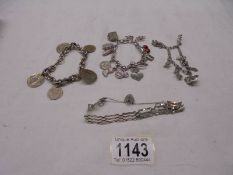 3 charm bracelets - 1 with coins, 1 with 925 St. Christopher & a gate bracelet with 925 padlock.