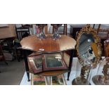 A retro 1960/70's teak 2 tier coffee table on black legs COLLECT ONLY