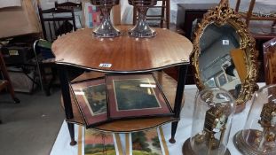 A retro 1960/70's teak 2 tier coffee table on black legs COLLECT ONLY