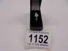 An 18ct gold diamond single stone ring hall marked Birmingham 1965, size H half, 2.4 grams.