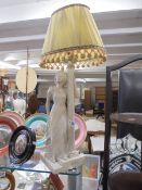 A tuscan figural table lamp with shade, COLLECT ONLY.