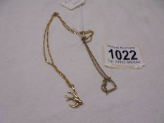 A 9ct gold swallow pendant on chain and a 9ct gold bracelet, 4.1 grams.