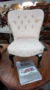 A deep buttoned wing back nursing chair, COLLECT ONLY