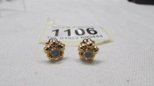 A pair of 9ct gold ear studs, 1.8 grams.