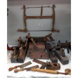 A quantity of vintage carpenters planes etc