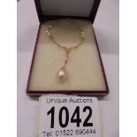 A 9ct gold and pearl necklace, 3.6 grams.