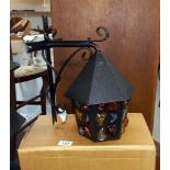 An unused vintage boxed Da Vinci Pebble outside lantern with multi-coloured glass and wrought iron