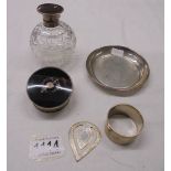 A silver topped scent bottle, silver pin tray, silver napkin ring, silver book mark, an a/f pill box