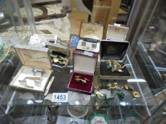 A mixed lot of cuff links etc.,