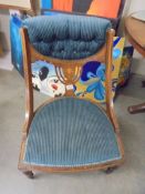 An Edwardian mahogany inlaid nursing chair, COLLECT ONLY.