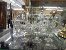 A pair of good quality cut glass decanters and a set of six glasses. COLLECT ONLY.