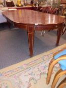 A large Victorian mahogany inlaid wind out table with two leaves, COLLECT ONLY.