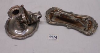 A silver plate chamber candlestick and candle snuffers with tray.