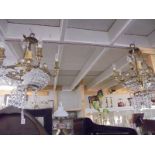 A pair of glass chandeliers in need of restoration. COLLECT ONLY.