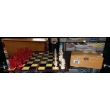 A vintage plastic chess set with wooden box & board