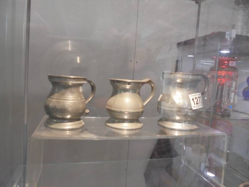 Seven antique pewter measures. - Image 2 of 3