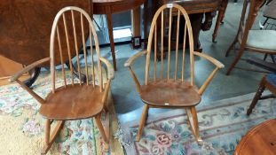 A pair of low Ercol rocking chairs
