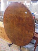 A Victorian oval mahogany tip top table, COLLECT ONLY.