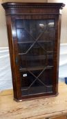 A mahogany corner cupboard with dental cornice & astragal glazed door, COLLECT ONLY