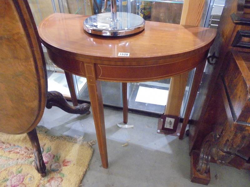 A mahogany inlaid D shaped table. COLLECT ONLY.